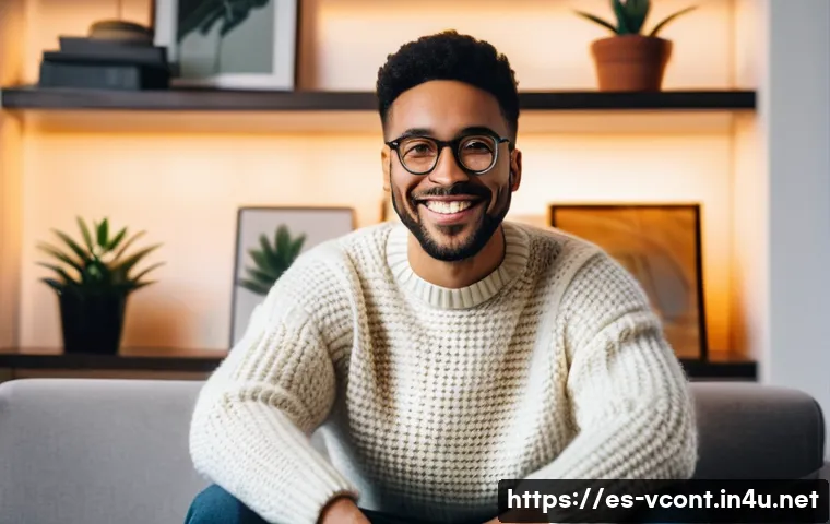 영상콘텐츠 전문가의 커뮤니티 참여 방법 - **Prompt:** A diverse content creator, aged 28, with a warm and genuine smile, sits comfortably in a...